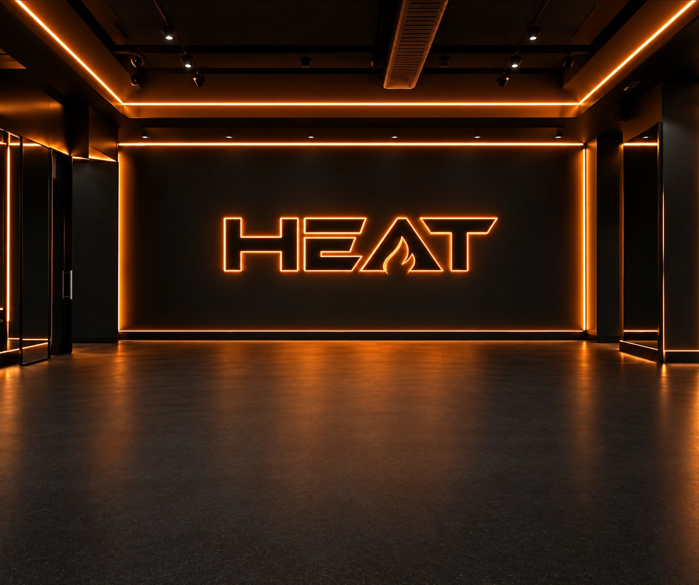 Studio concept: a wide open floor framed by orange ceiling lights and a HEAT wall sign.